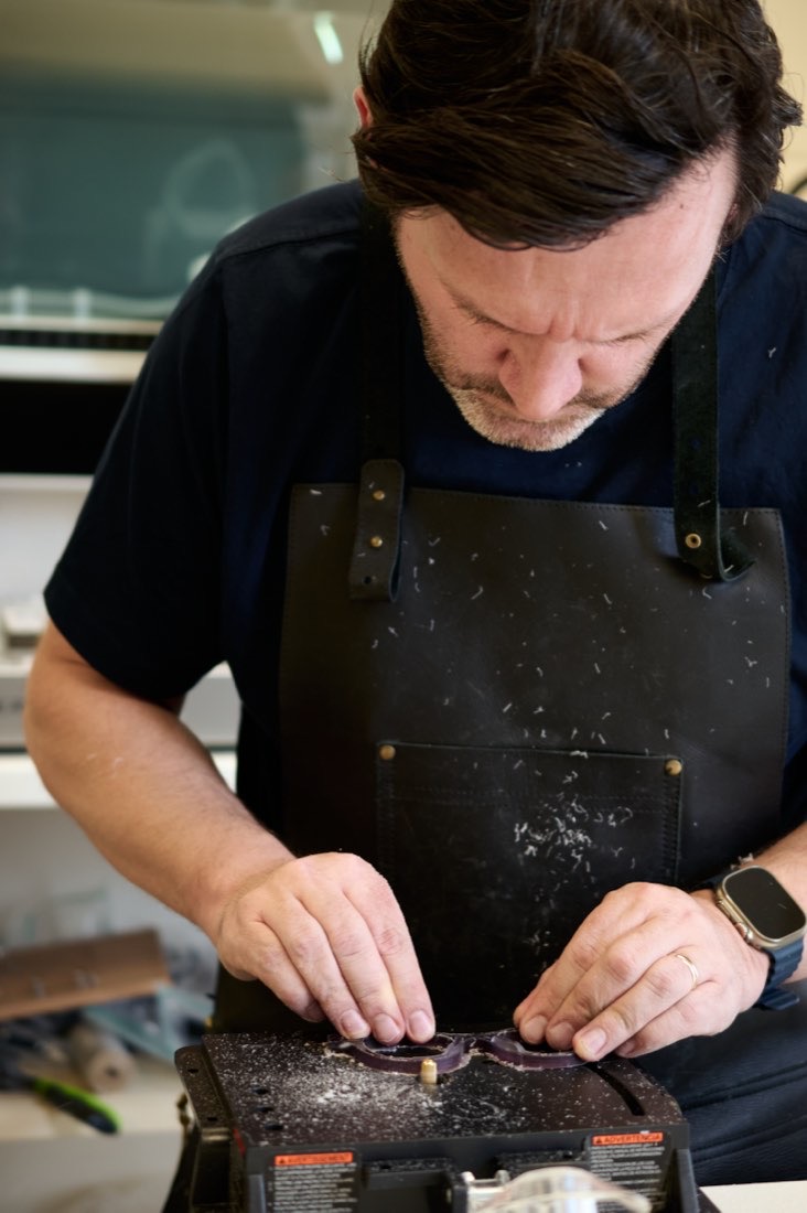Gavin Winstanley working at the bench in the Park Road workshop