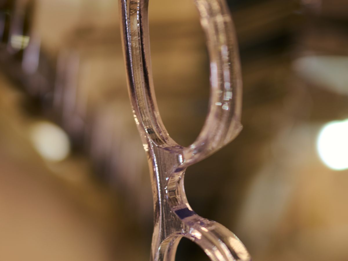 Close-up of a spectacle lens in a handmade frame